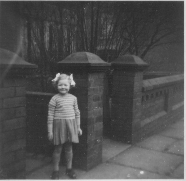Ann b-1949 with pigtails.jpeg